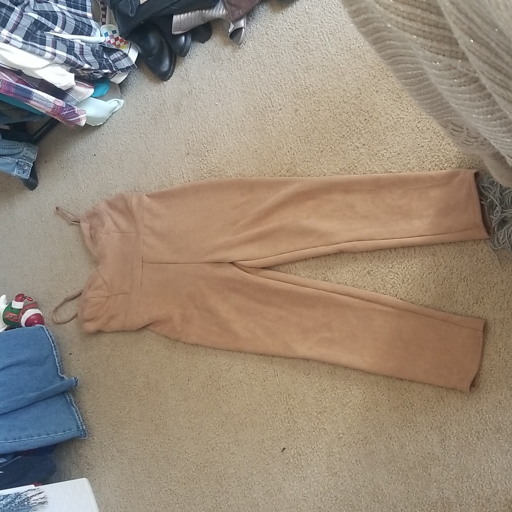 Size L.  Haute Monde. Faux suede.n fits like a medium..